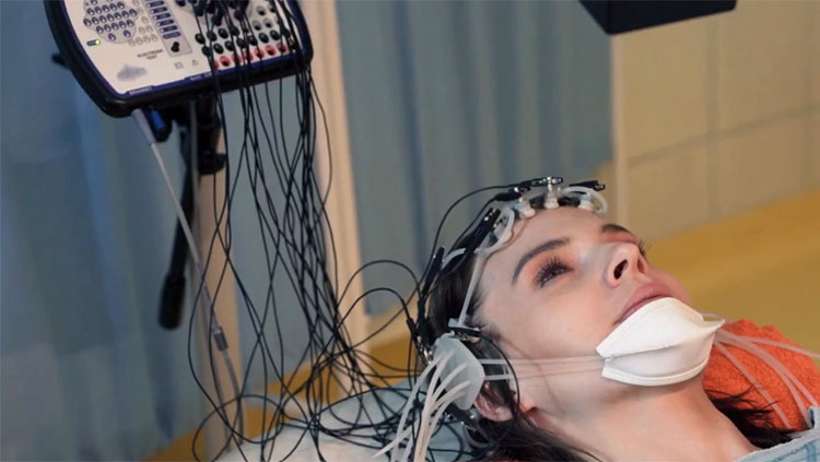 Woman getting brain scan